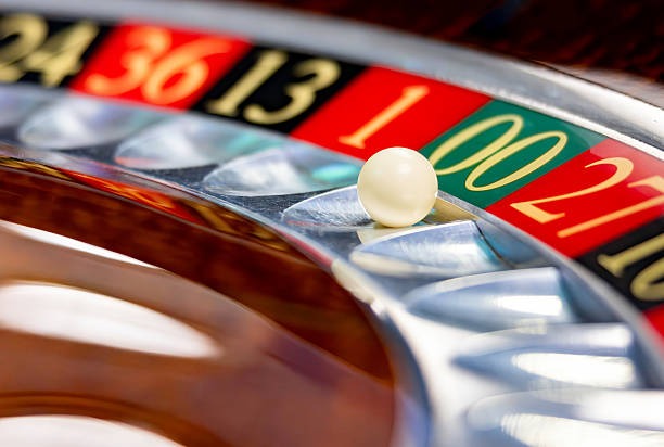 Live dealer blackjack table with multiple camera angles and player chat interface